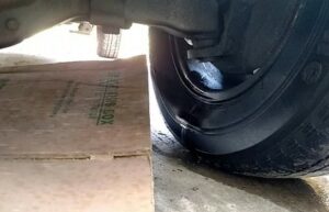 Car Leaking Fluid Front Passenger Side Tire [Causes + Fixed]