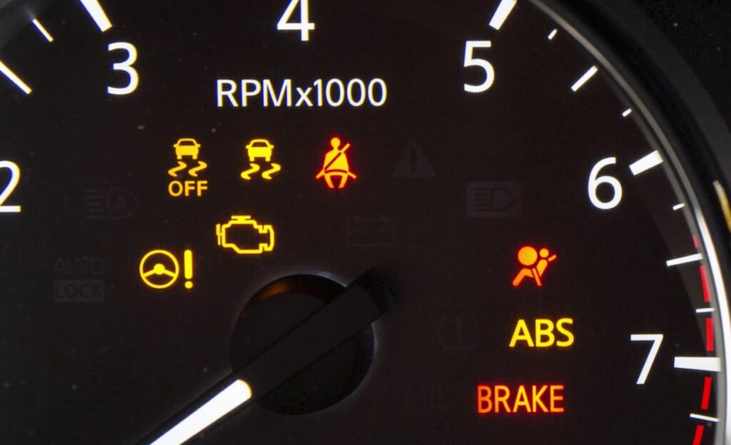 What Is The Red Car Symbol On Dashboard Nissan? Explained