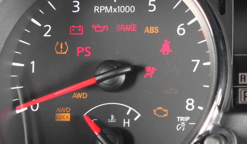 What Is The Red Car Symbol On Dashboard Nissan? Explained